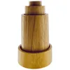 A set of three wooden stacking cylinders of decreasing size, presented on a white background. Produktbild-Vorschau