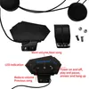 A flat lay of motorcycle helmet Bluetooth headset components and accessories, with labels indicating their functions. Produktbild-Vorschau