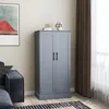 A gray storage cabinet with double doors stands in a room next to a sofa and a window with curtains. Produktbild-Vorschau