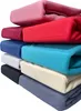 A stack of folded fleece sheets in various colors. Produktbild-Vorschau