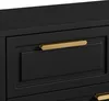 A close-up view of a black cabinet with a gold handle. Produktbild-Vorschau