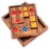 A wooden sliding puzzle with colored circles inside a wooden tray. Produktbild-Vorschau