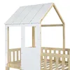Close-up view of the top section of a wooden children's bed with a house-shaped roof and white paneling. Náhled obrázku produktu