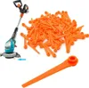 A cordless grass trimmer and a pile of replacement blades. Produktbild-Vorschau