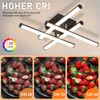 A modern ceiling light fixture with multiple arms, shown with strawberries under different CRI (Color Rendering Index) lighting conditions. Voir les images du produit