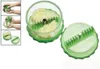 A garlic press with chopped garlic inside and a separate lid. Produktbild-Vorschau