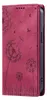 A pink flip phone case with a dandelion design. Produktbild-Vorschau