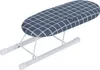 A mini ironing board with a checkered pattern on a white background. Produktbild-Vorschau