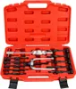 A red toolbox containing a set of bearing puller tools. Voir les images du produit