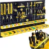 A well-organized workshop tool board with various tools and storage bins. Voir les images du produit