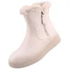 A single beige boot with faux fur trim and a zipper closure, presented against a white background. Produktbild-Vorschau