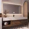 A modern bathroom vanity with a sink, faucet, and mirror. Anteprima dell’immagine prodotto
