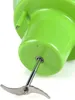 Close-up view of the blade and shaft of a green food processor. Náhľad obrázku produktu