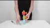 A person's hands are assembling a colorful toy. Podgląd zdjęcia produktu