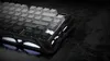 A close-up shot of a mechanical keyboard with its keys illuminated. Produktbild-Vorschau