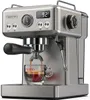 A silver espresso machine is brewing coffee into a clear glass cup. Produktbild-Vorschau