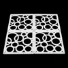 Four white modular lattice panels with circular cutouts are arranged in a square on a black background. Náhled obrázku produktu