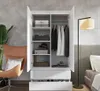 An open wardrobe with clothes and accessories inside, placed in a bedroom setting. Produktbild-Vorschau