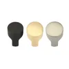 Three cabinet knobs in different colors. Produktbild-Vorschau