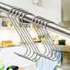 A set of silver S-hooks hanging from a metal rod, with a blurred kitchen background. Produktbild-Vorschau