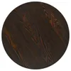 A close-up view of a round tabletop with a dark wood grain pattern. Náhľad obrázku produktu