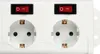 A close-up view of a white power strip with two outlets and two red switches. Produktbild-Vorschau