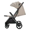 A side view of a beige and black stroller against a white background. Anteprima dell’immagine prodotto