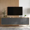 A modern living room setup with a TV mounted on a slatted wood wall above a floating media console. Produktbild-Vorschau