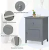 A grey nightstand with a drawer and a door, shown with close-up insets highlighting its features, and a small potted plant and cup on top. Náhľad obrázku produktu
