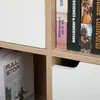 A close-up view of a bookshelf with books and drawers. Produktbild-Vorschau