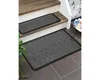 A doormat and a stair runner are shown on a tiled floor and wooden stairs. Podgląd zdjęcia produktu