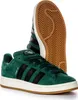 A pair of green Adidas Campus sneakers with black stripes and a gum sole, shown from a side angle with one shoe standing and the other lying on its side. Produktbild-Vorschau