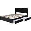 A black upholstered bed frame with a slatted mattress support and two pull-out drawers visible underneath. Anteprima dell’immagine prodotto