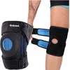 A person's arm is shown adjusting a black knee brace with blue accents. Produktbild-Vorschau