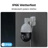 A security camera is shown mounted on a wall, with rain falling around it, illustrating its weather resistance. Produktbild-Vorschau