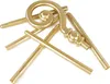 Several gold-colored segments of a staff or scepter are arranged on a white background. Anteprima dell’immagine prodotto