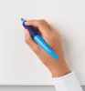 A hand holding a blue pen over a white surface. Anteprima dell’immagine prodotto