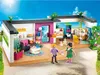 A Playmobil guest bungalow set with figures in an outdoor setting. Produktbild-Vorschau
