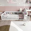 A child's bedroom with a white bed frame, shelves, and a desk. Produktbild-Vorschau