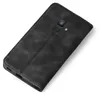 A black flip case for a smartphone is shown from a diagonal top-down perspective against a white background. Produktbild-Vorschau