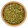 A top-down view of dried chamomile flowers in a wooden bowl. Náhľad obrázku produktu