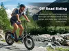 A man riding an electric bike on a rocky, wooded trail with mountains in the background. Produktbild-Vorschau