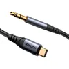 A close-up shot of a USB-C to 3.5mm AUX audio cable against a white background. Anteprima dell’immagine prodotto