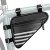 A black triangular bicycle frame bag with reflective stripes is attached to the frame of a bicycle. Produktbild-Vorschau
