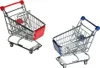 Two miniature shopping carts, one with red accents and one with blue accents, are shown against a white background. Produktbild-Vorschau