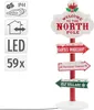 A Christmas-themed directional signpost with multiple signs pointing to different locations. Podgląd zdjęcia produktu