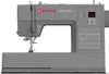 A studio shot of a gray Singer Heavy Duty sewing machine against a white background. Náhled obrázku produktu