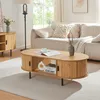 A living room scene featuring a coffee table in front of a couch. Anteprima dell’immagine prodotto