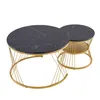 Two nesting coffee tables with black marble-patterned tops and gold metal frames. Náhľad obrázku produktu