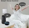 A woman is waking up in bed and stretching, while a smart thermostat and voice assistants are visible on a table. Náhled obrázku produktu